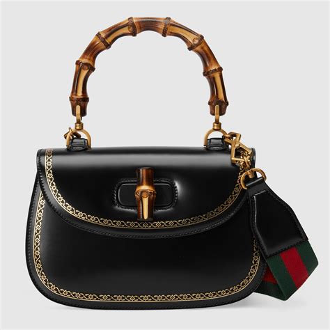 gucci purse with bamboo handle.